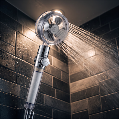 High-pressure spray backlit in a dark shower