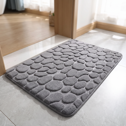 Bath mat at a bathroom doorway
