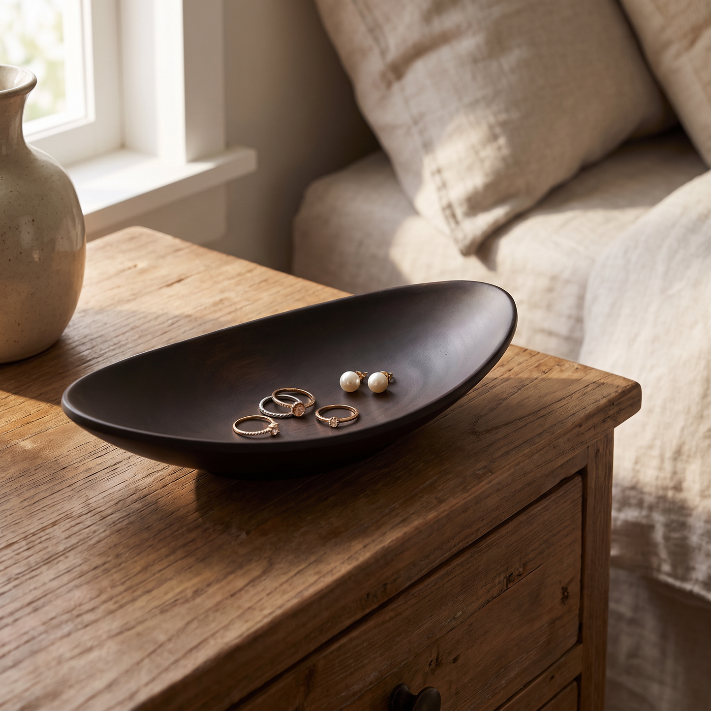 Tray holding rings on a bedroom dresser