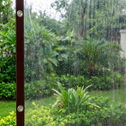 Close-up of rain droplets on the clear sheet
