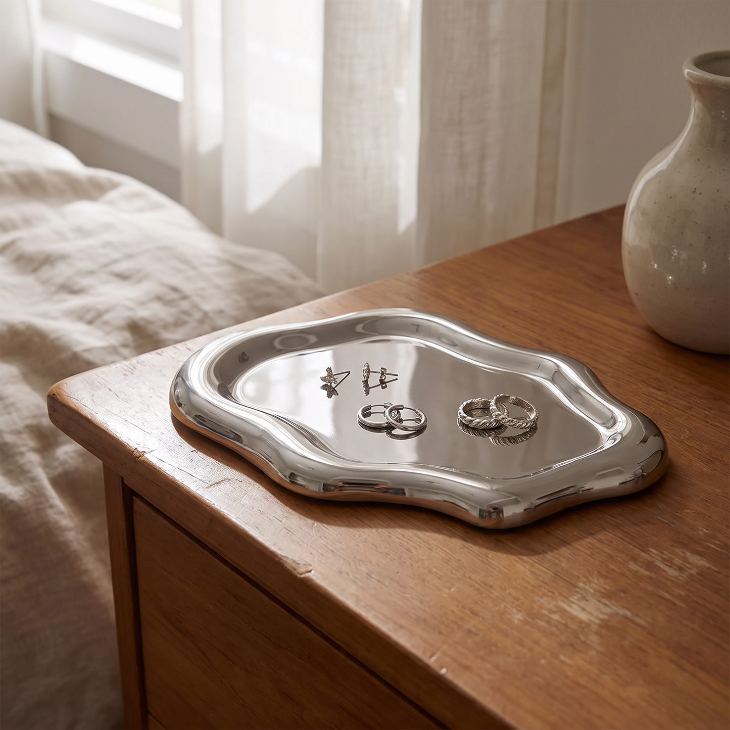 Cloud jewellery tray on a dresser with earrings