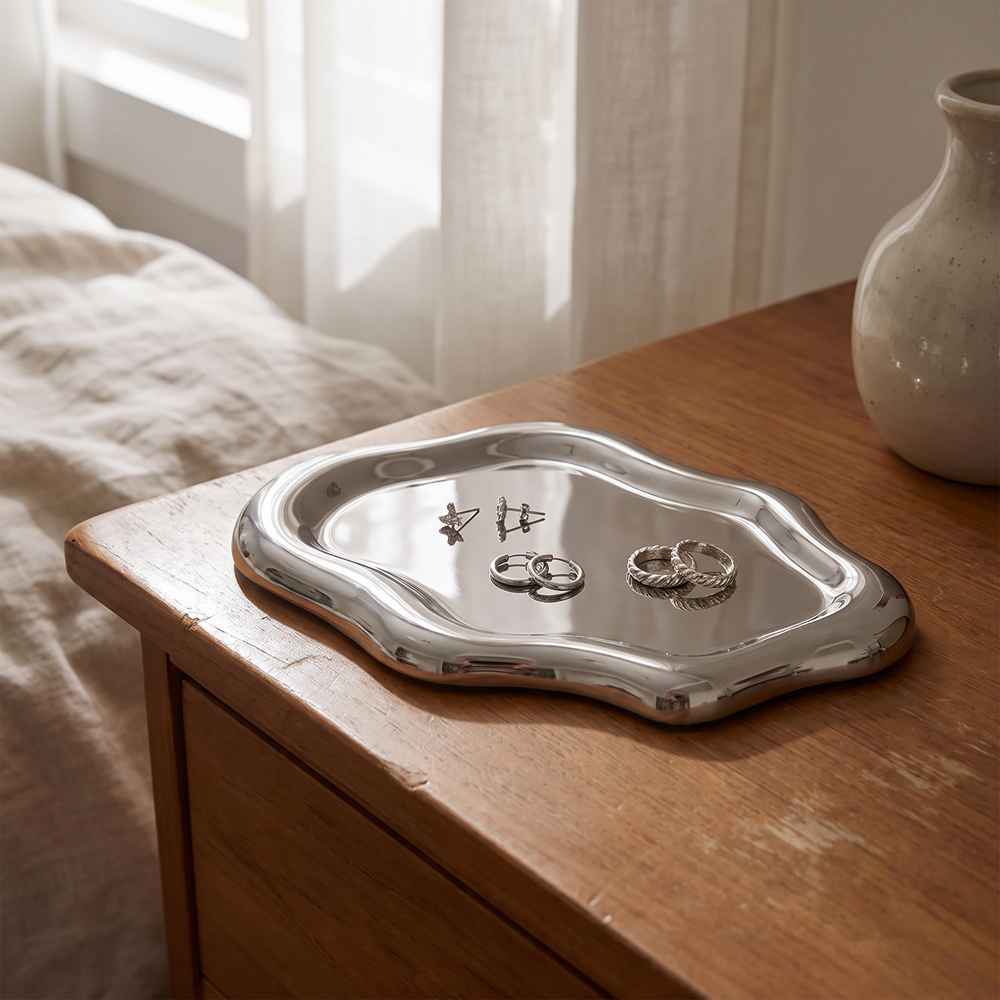 Cloud jewellery tray on a dresser with earrings